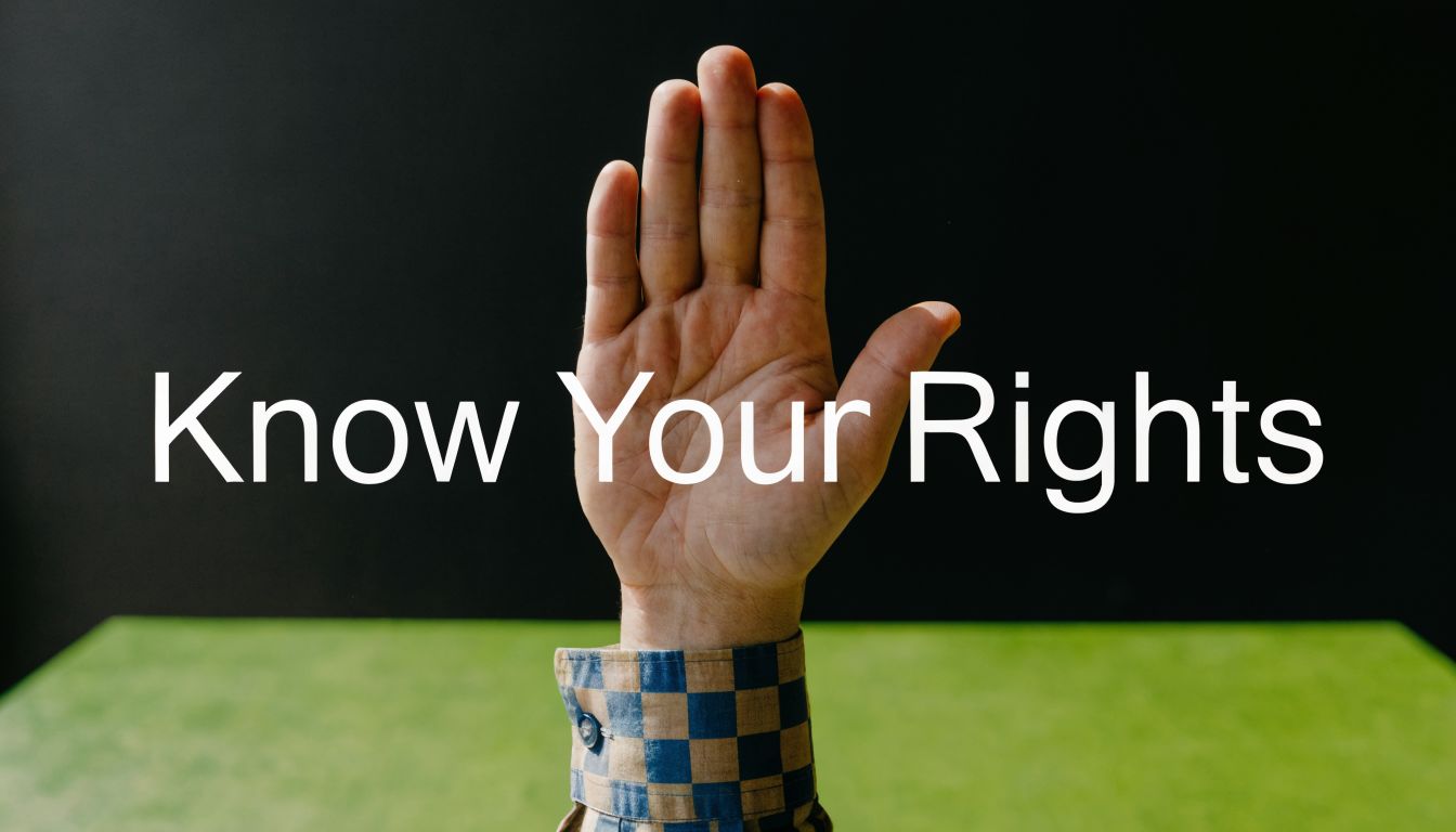 A hand raised in a stop gesture against a black background with the text Know Your Rights